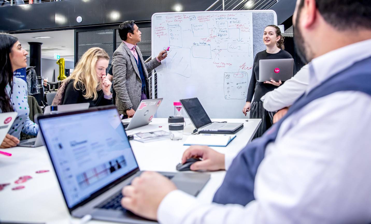 Group of colleagues brainstorming 