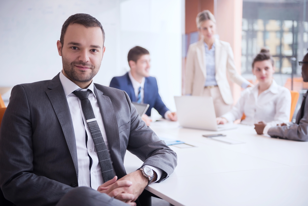 Young business people group have meeting and working in modern bright office indoor
